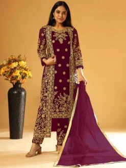 Wine Colour Party Wear Salwar Suit In Net Fabric.
