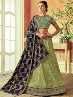Green Woven Lehenga With Embroidered Blouse