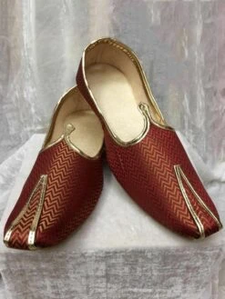 Brocade Fabric Mojari In Maroon Colour.